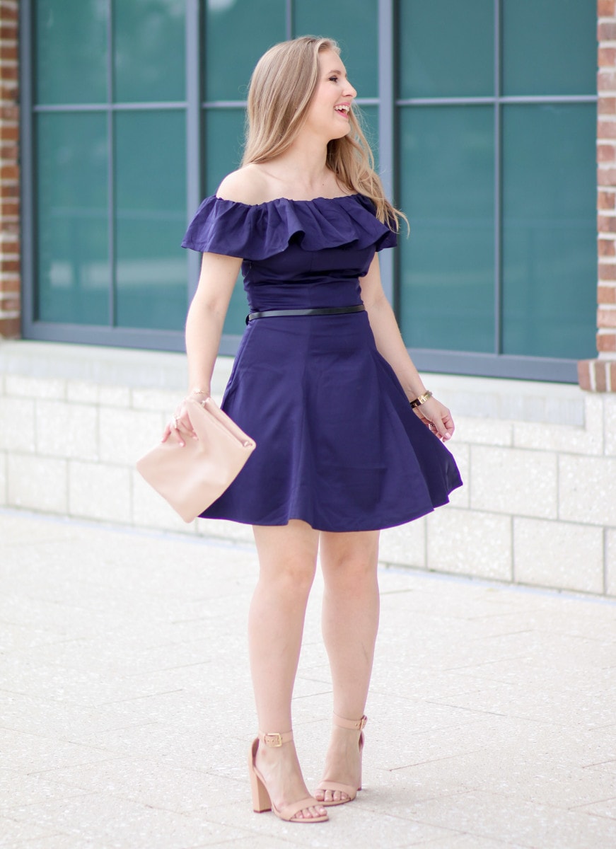 I'm loving this navy-off-the-shoulder dress styled by Ashley Brooke Nicholas! The navy looks amazing combined with the rose quartz fold-over clutch from Express and the chunky ankle-strap nude heels!