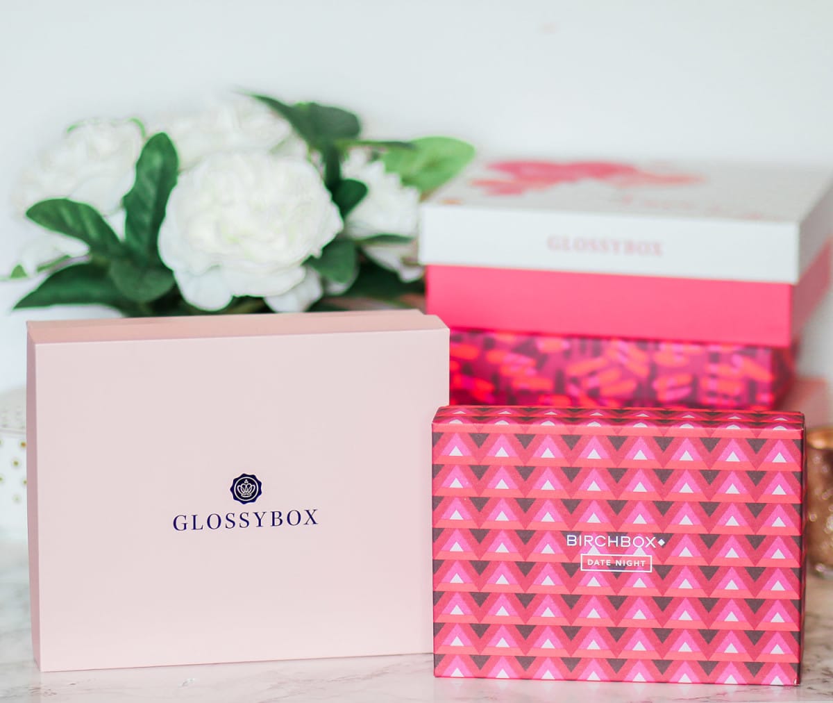 Interested in subscribing to Glossybox or Birchbox? This post shares the pros and cons of each subscription plus example boxes from January and February 2016!