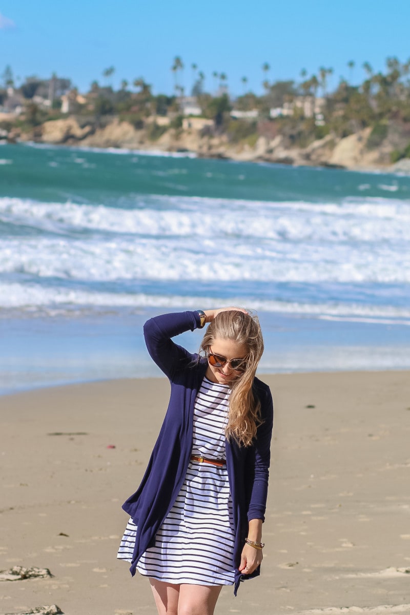 Ashley Brooke Nicholas styles an affordable striped dress that's perfect for spring break or summer vacation at the Pacific Edge Hotel in Laguna Beach, California!