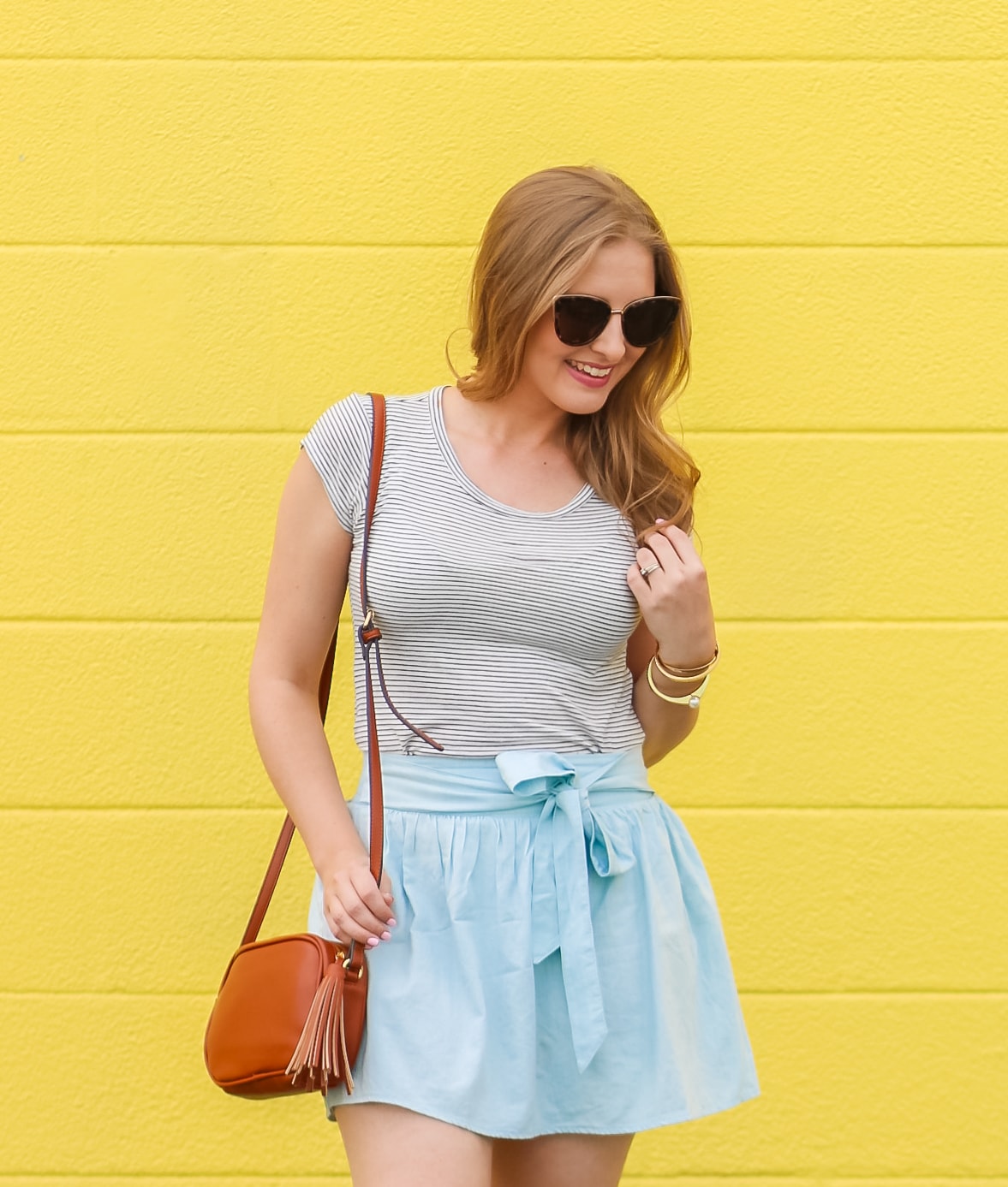 Looking for a cute summer vacation outfit idea? This casual look by Ashley Brooke Nicholas is absolutely adorable. I'm obsessed with the mint green Keds from Zappos, and the Quay My Girl sunglasses in tortoiseshell might be the great sunnies of all time!