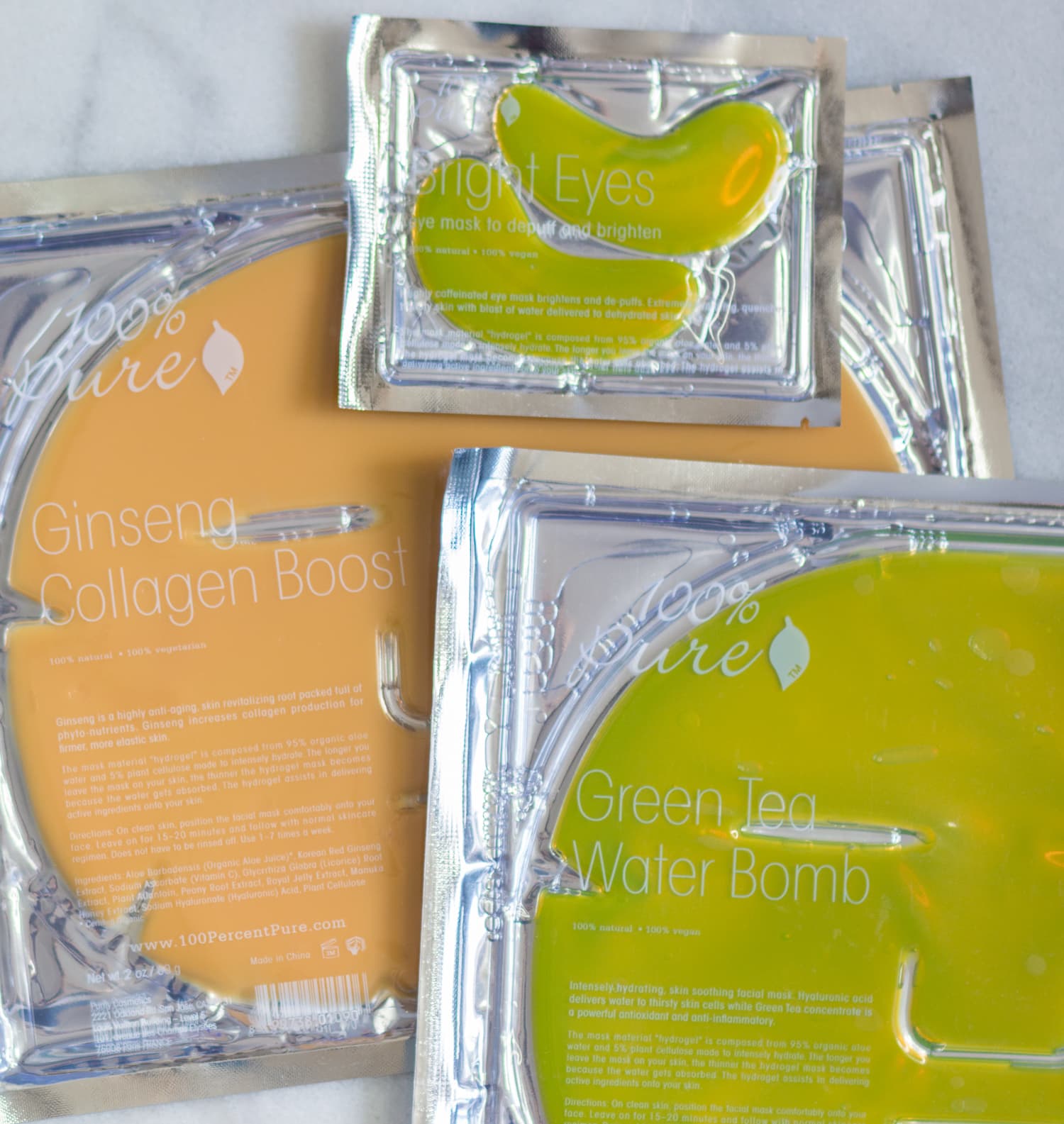 100% Pure Ginseng Collagen Mask, Green Tea Water Bomb, and Bright Eyes Mask review | Click through to see the full post by beauty blogger Ashley Brooke Nicholas