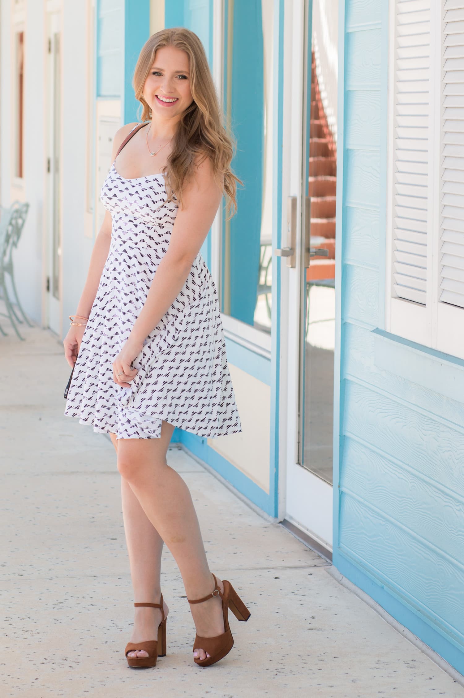 The perfect little sundress, Kendra Scott necklace, and tan platform heels | style blogger Ashley Brooke Nicholas
