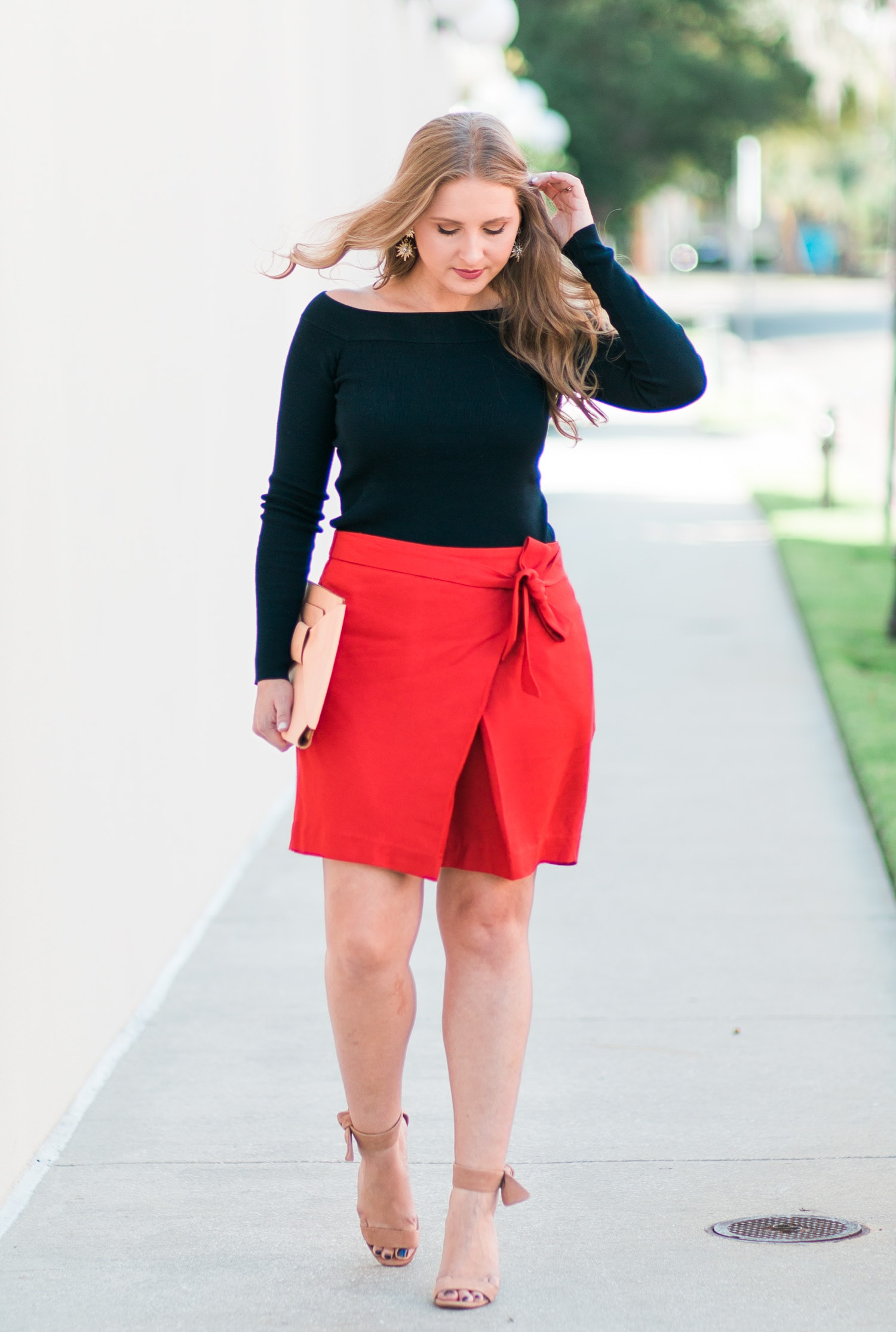 banana-republic-classy-fall-outfit-idea-orange-bow-skirt-navy-off-the-shoulder-sweater-nude-bow-clutch