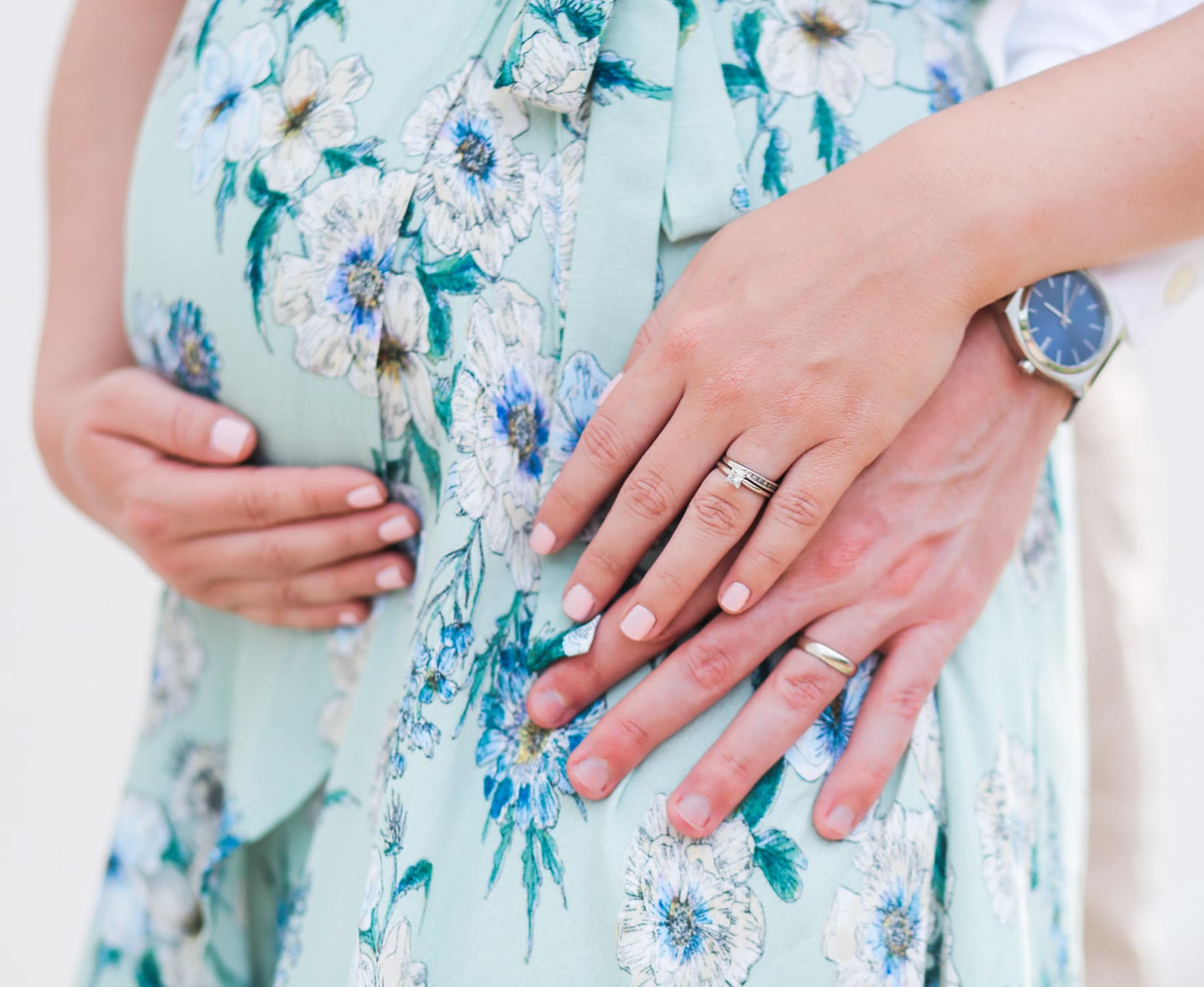 OPI Pretty Pink Perseveres baby pink nail polish | Cute pregnancy announcement photo idea | Rose gold Oh Baby balloons | ASTR pale green floral wrap dress | Flattering maternity dress | Florida beauty and fashion blogger Ashley Brooke Nicholas