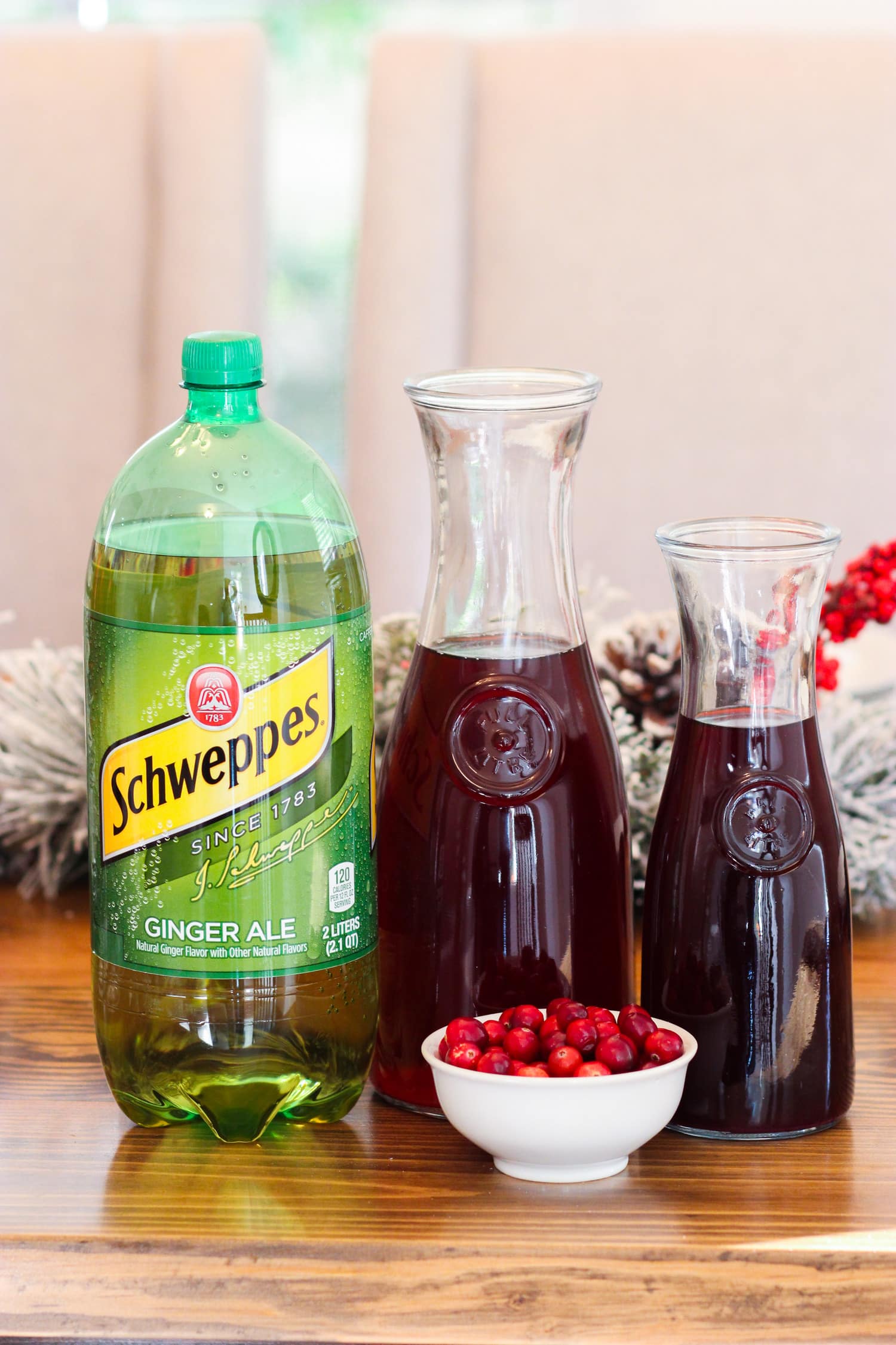 holiday party on a budget schweppes mocktail cranberry drink Ashley Brooke Nicholas